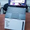 The Fluidstance Lift laptop stand and whiteboard with a 13-inch laptop