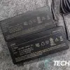 The voltage and other information on the bottom of the Monoprice 65W and 100W Laptop Chargers